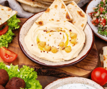 Flavors of Israel Our menu is a vibrant celebration of Mediterranean and Middle Eastern flavors, crafted with passion and tradition. Indulge in crispy kubbeh, golden-fried falafel balls, and crunchy pita nachos, served with creamy hummus and bold spices.